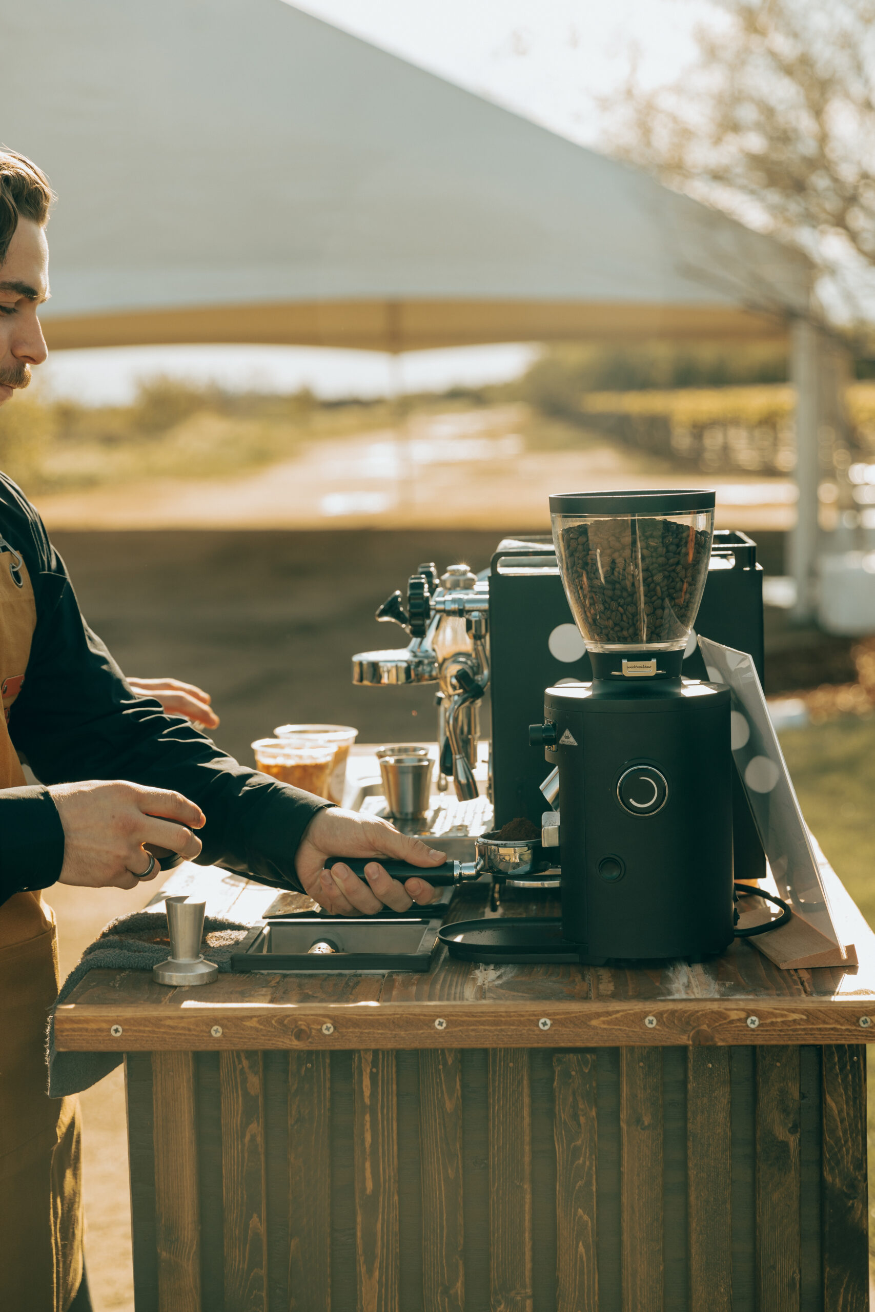 Barista pouring latte